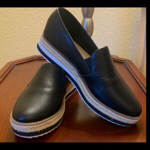 A New Day Black and Tan Flats Sleek Slip-On Design